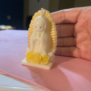 White and Yellow Religious Candle